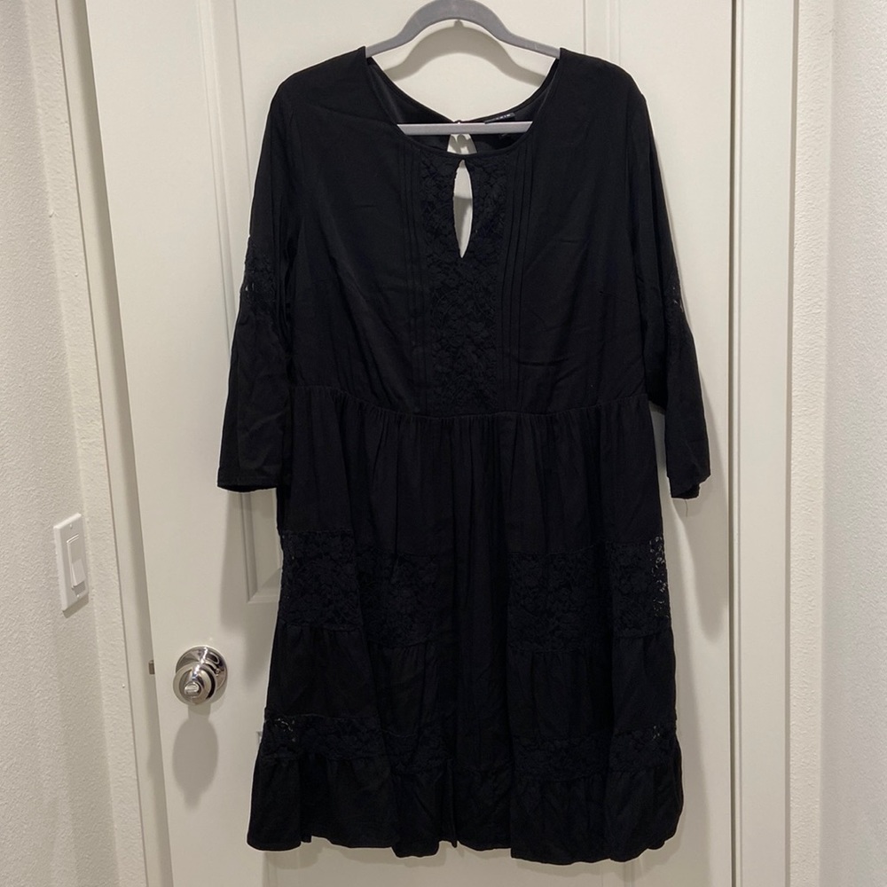 Black 3/4 sleeve cocktail dress with lace detail